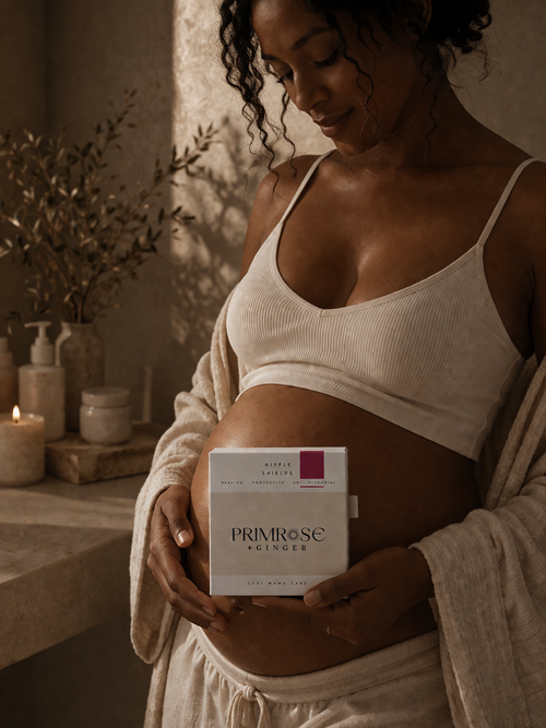Mother using reusable silver nipple cups for breastfeeding support and comfort