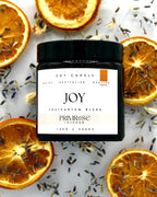 Joy botanical soy candle with uplifting citrus and neroli scent blend
